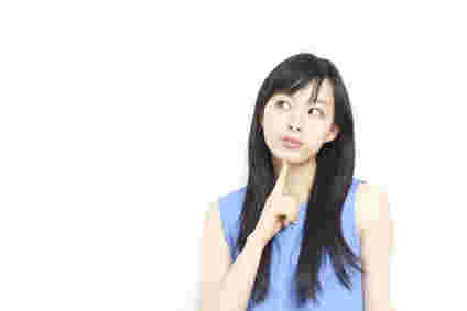考えている人の画像