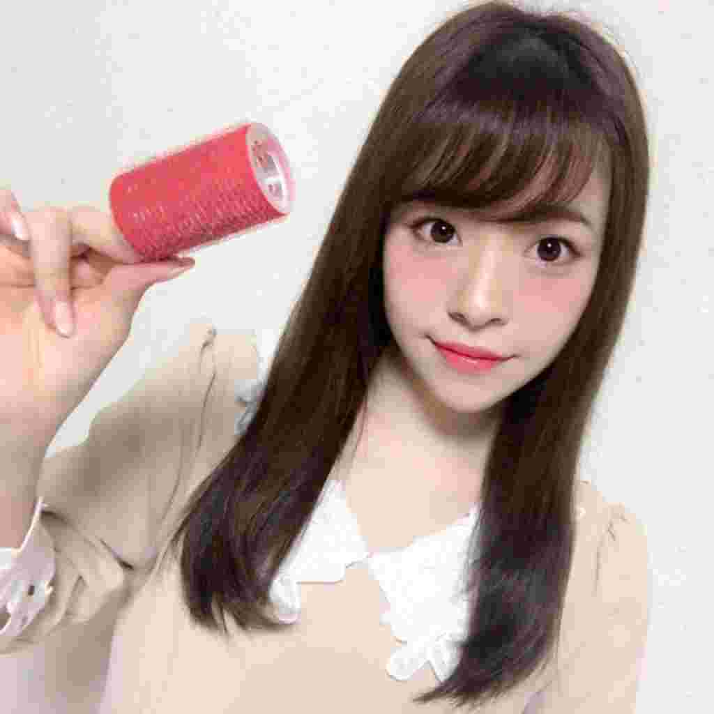 マジックカーラーを手に持っている女性