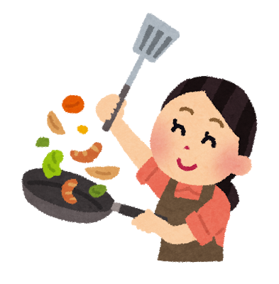 フライパンで調理をする女性