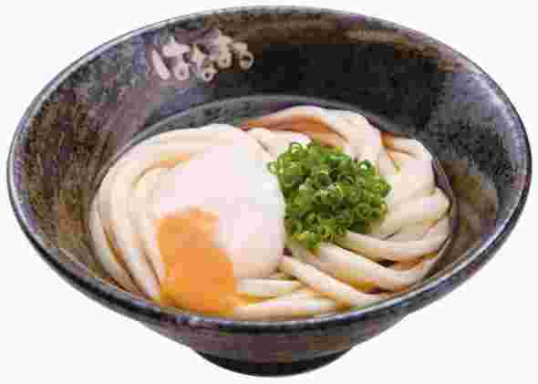 卵ののったうどんの画像