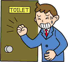 トイレに駆け込む男性