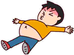 食べ過ぎて倒れる男性