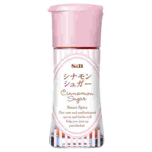 ピンクのストライプの瓶のシナモンシュガー
