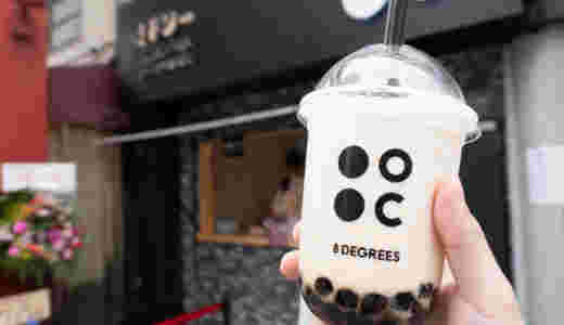 8ドシーのタピオカドリンクと背景に店舗外観